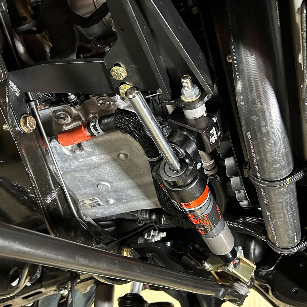 S6B Steady Track Steering Stabilizer Kit, 2-6" Lift, 2011+ F250 & F350 installed inside the body of a car