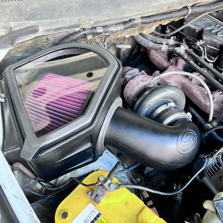 Cold Air Intake for 1994-2002 Dodge Ram Cummins 5.9LL installed in the engine compartment of a vehicle.