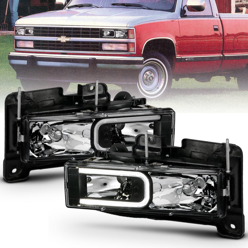 ANZO 1999-2000 Cadillac Escalade Crystal Headlights with LED Light Bar - Black Housing Pair