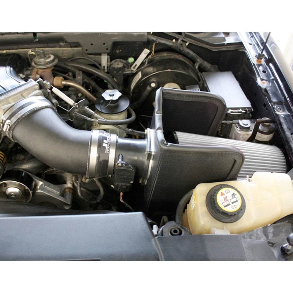 JLT BIG Air Intake for 1999-2004 F-150 Lightning & 2002-2003 F-150 Harley - S&B installed in the engine compartment of a vehicle