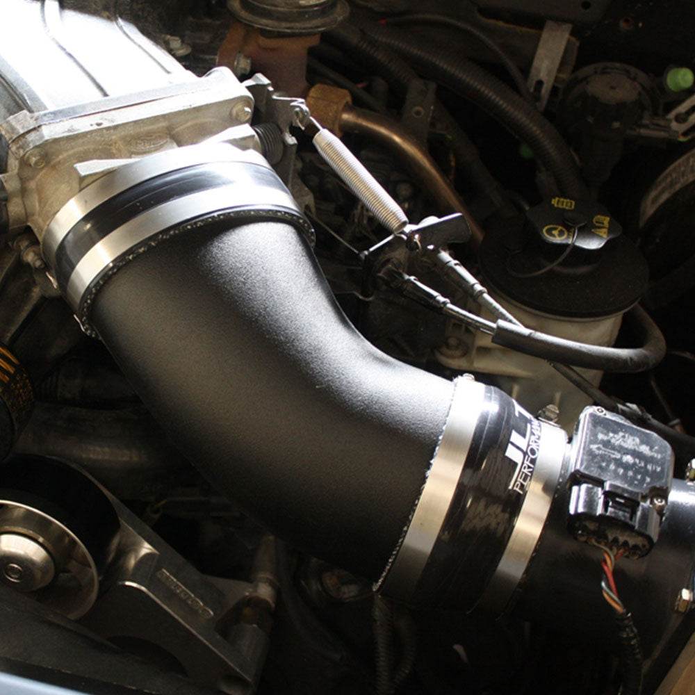 JLT BIG Air Intake for 1999-2004 F-150 Lightning & 2002-2003 F-150 Harley - S&B installed in the engine compartment of a vehicle