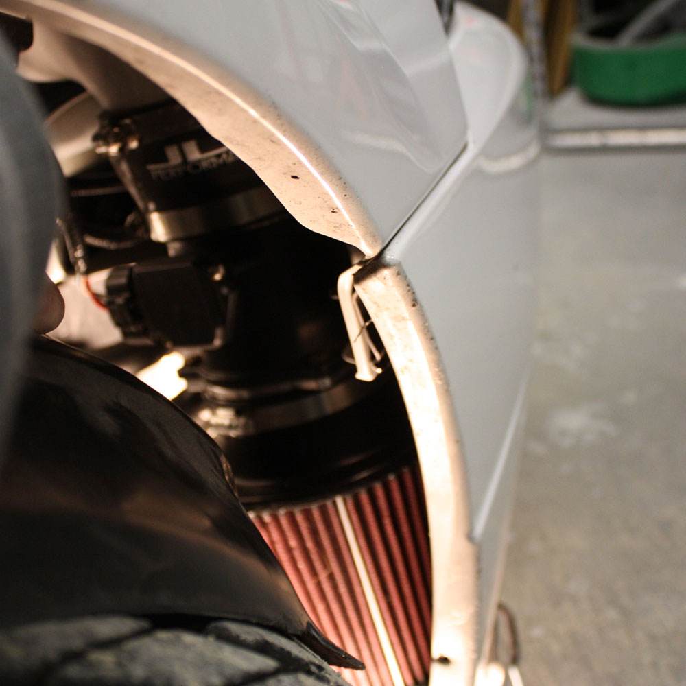 Close-up JLT Cold Air Intake Kit for 2003-2004 SVT Cobra - S&B installed in the engine compartment of a vehicle
