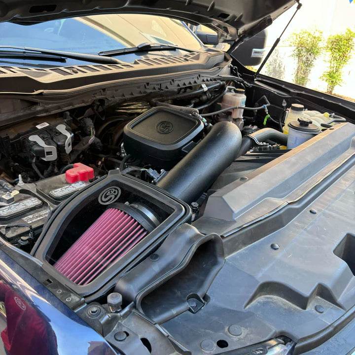 Cold Air Intake for the 2023-2025 Ford F250 F350 7.3L - S&B installed in the engine compartment of a vehicle