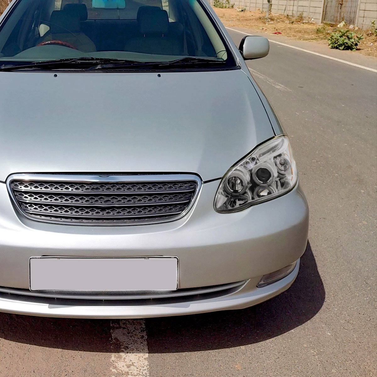 2003-2008 Toyota Corolla Dual Halo Projector Headlights (Chrome Housing/Clear Lens)