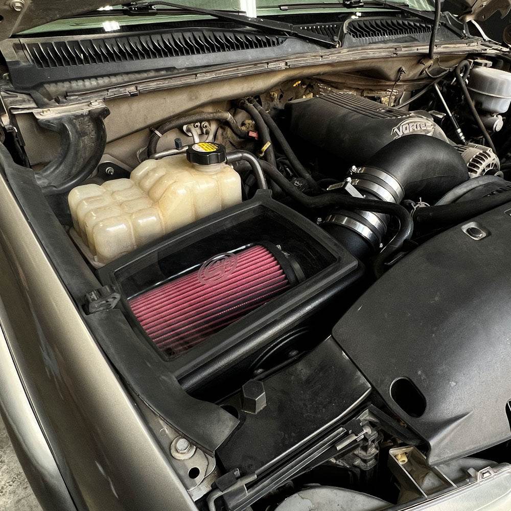 Cold Air Intake for 99-07 Chevy Silverado, GMC Sierra 1500, 2500, 3500 / 07-08 Tahoe, Yukon - S&B installed in the engine compartment of a vehicle.
