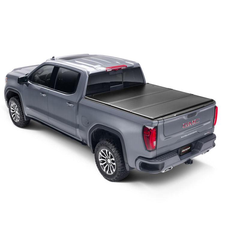 UnderCover 05-21 Nissan Frontier 5ft w/ Factory Cargo Management System Triad Bed Cover