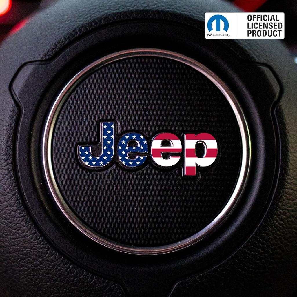Jeep logo with American flag design on a car interior background