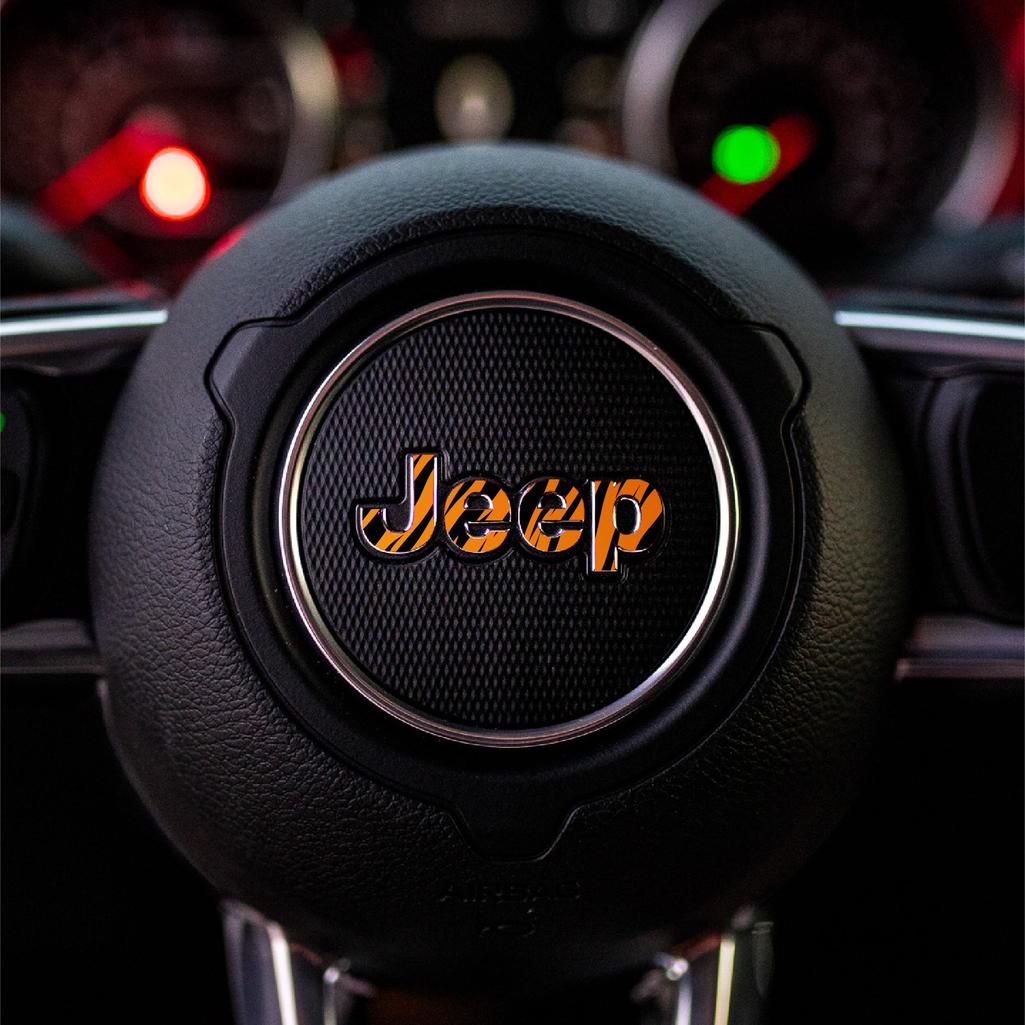Close-up of a tiger Jeep steering wheel with logo