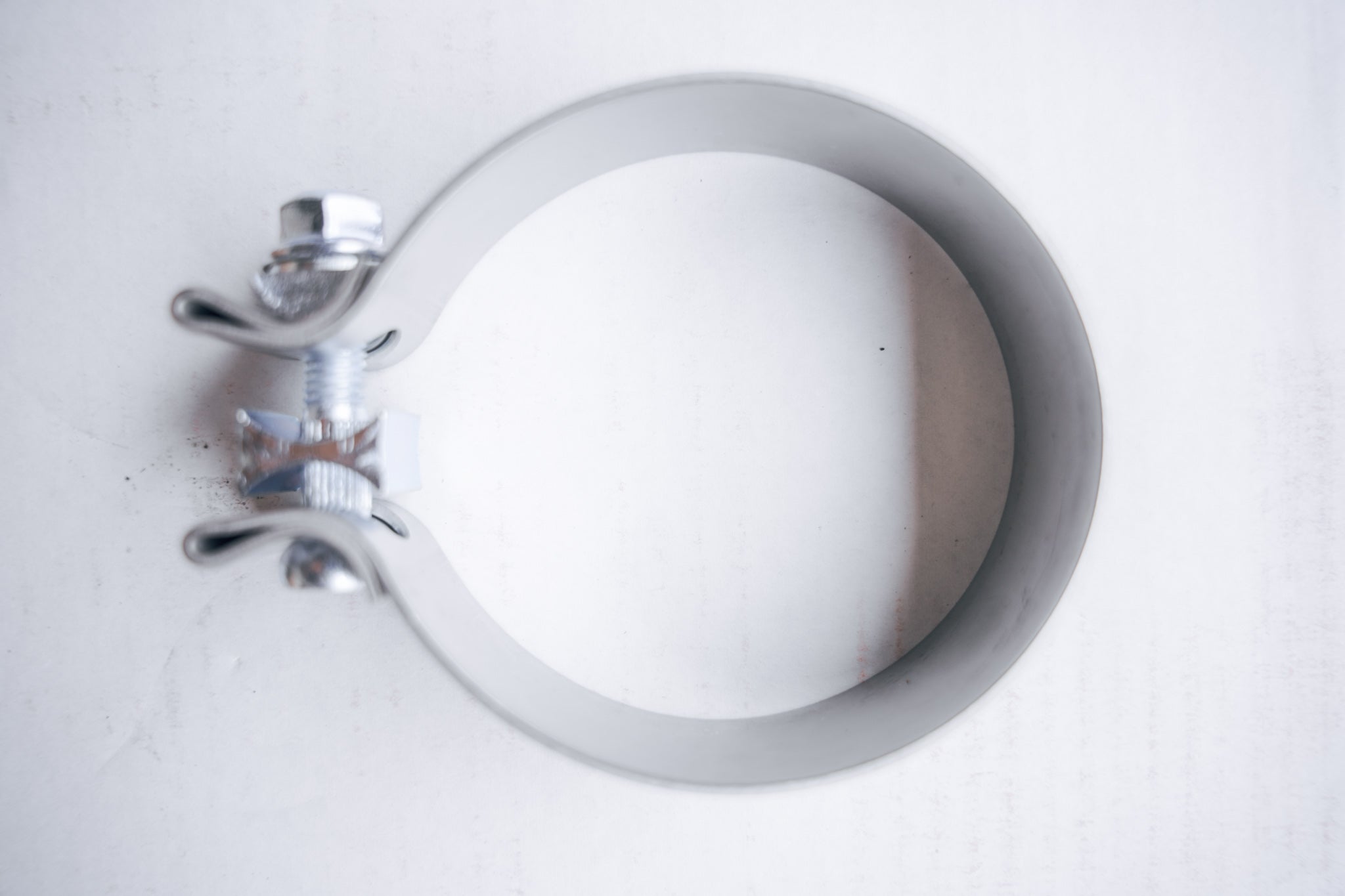 3-1/2" Stainless Steel Band Clamp for Notched Slip Joint Connections.