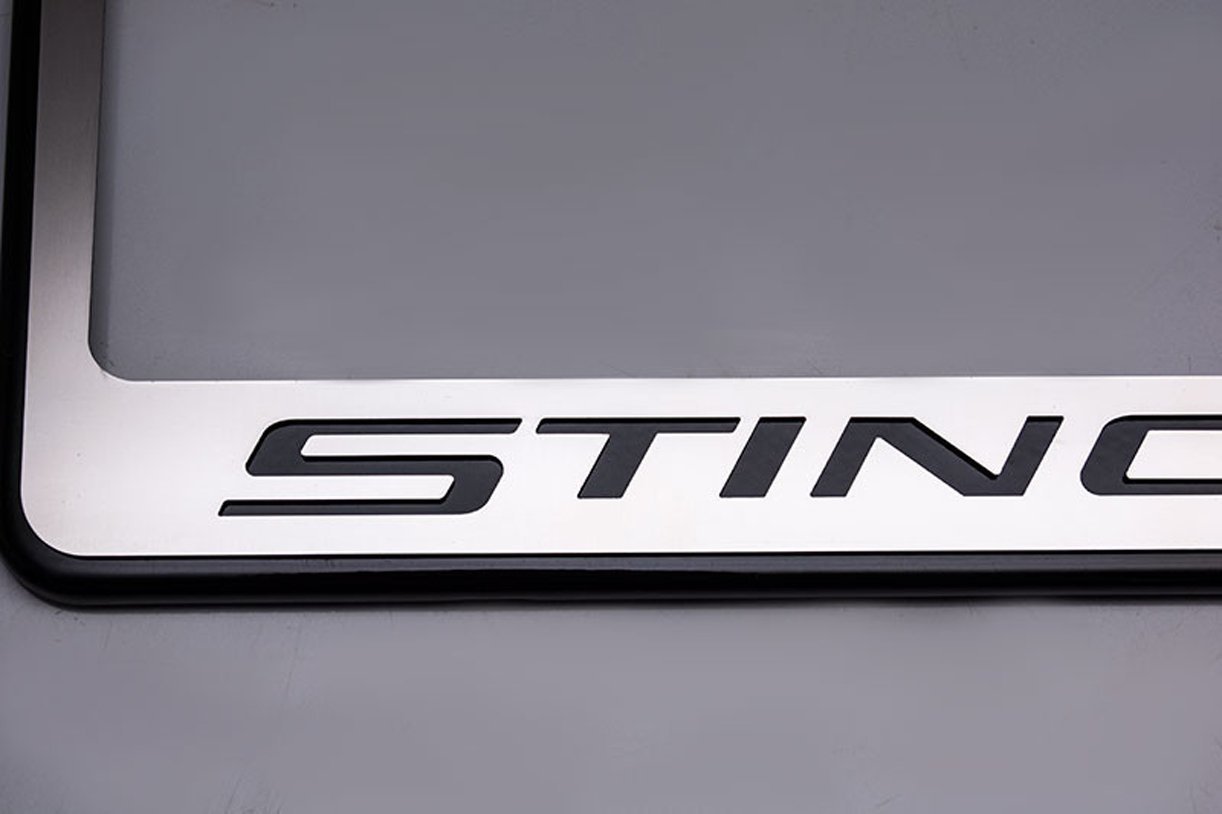 2014 C7 Corvette Stingray License Plate Frame - Chrome w/Stainless Steel Overlay & Carbon Fiber "STINGRAY" Script